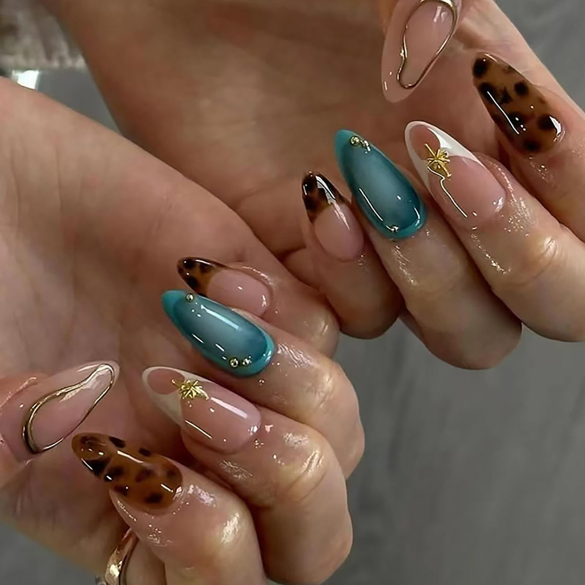 Dulyork French Tip almond press-on nails with gold rhinestones for instant glamorous manicure