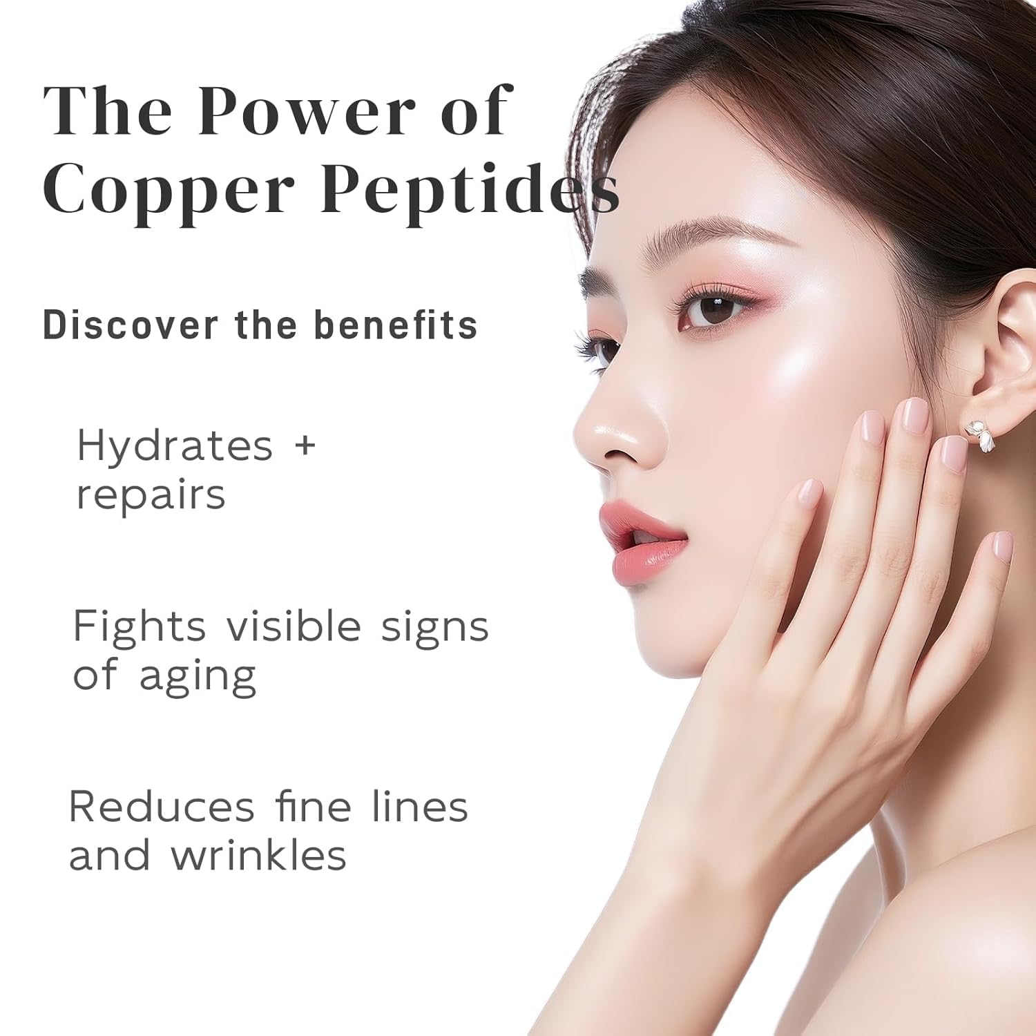 Dumie Copper Peptide Serum on fingertips showing easy application for radiant skin.