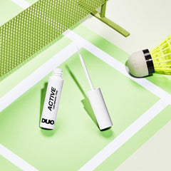 DUO Active Clear Eyelash Glue delivers waterproof hold through workouts and humidity, keeping lashes secure.