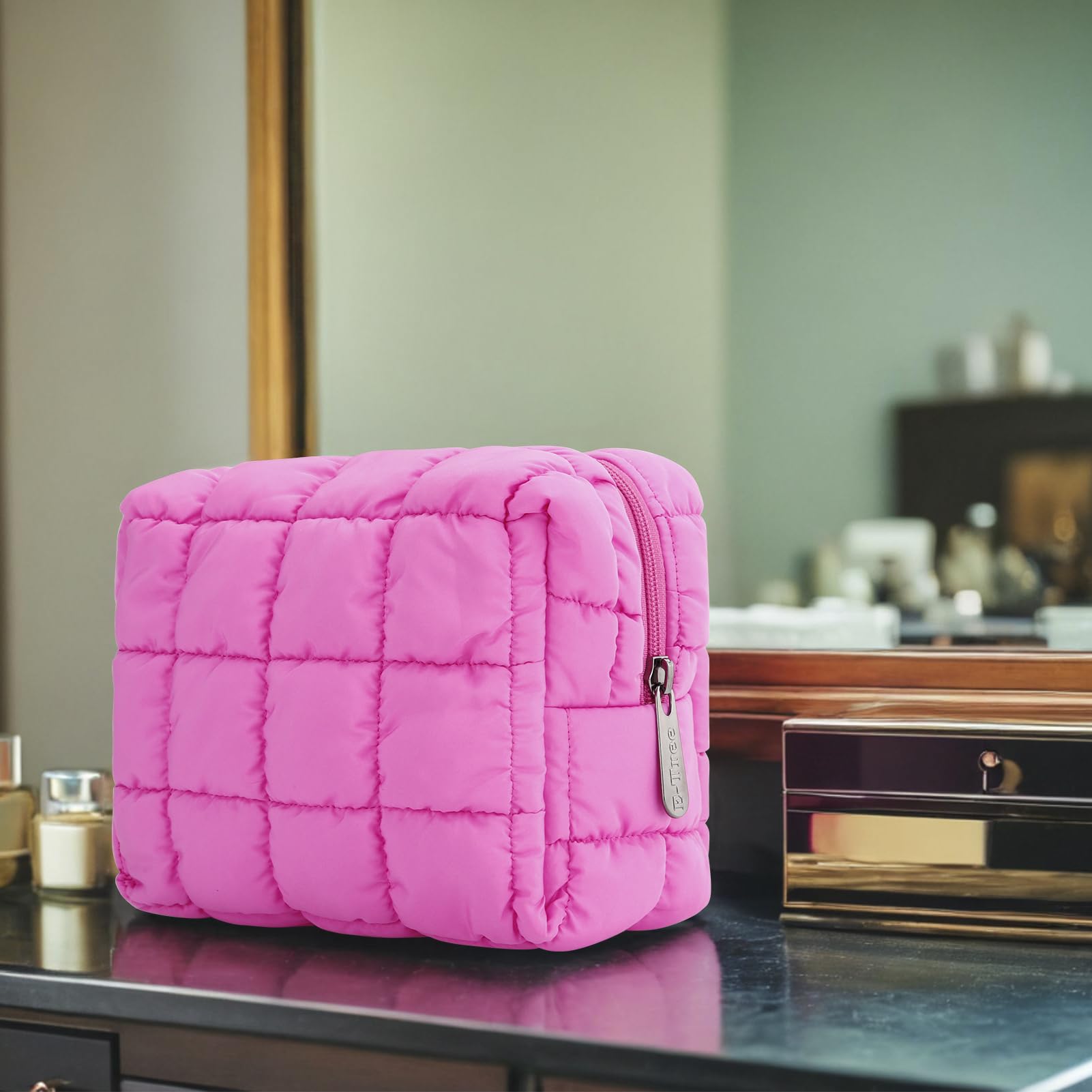 E-Tree makeup bag pillow-texture shows soft cushioning ideal for travel.