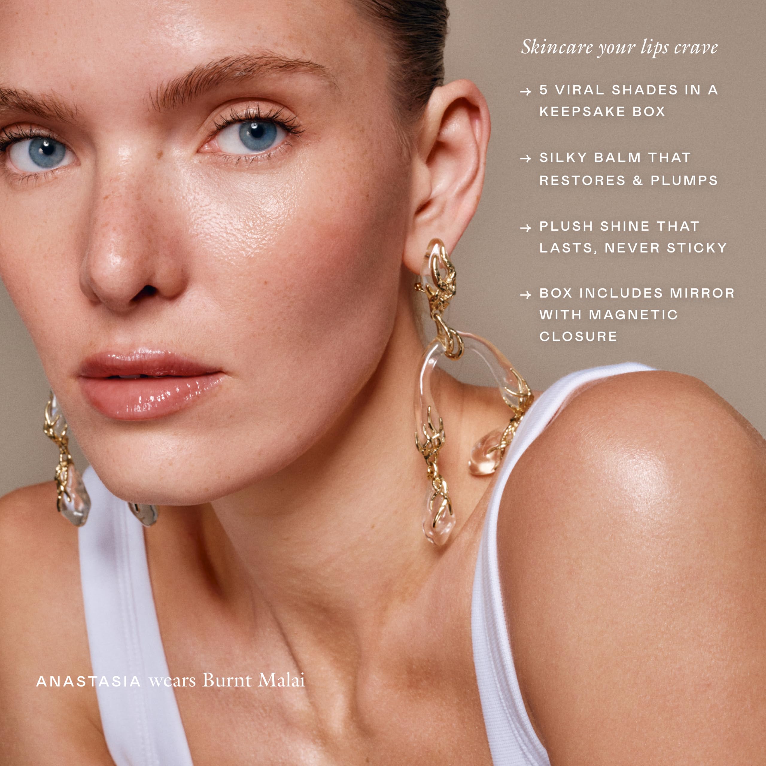 EADEM Le Chouchou Bisous Butter Mochi swatch delivers clear gloss and hydration.