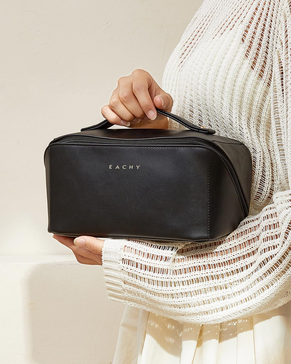 EACHY Travel Makeup Bag opens flat for quick packing and unpacking.