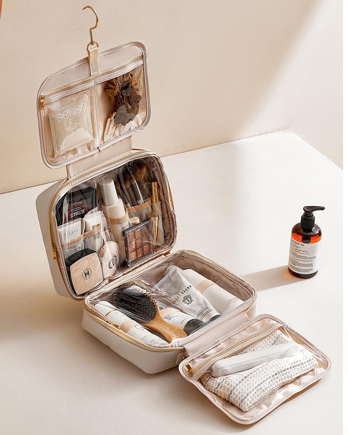 EACHY Travel Toiletry Bag Plait White spacious-rolled—compact when packed, roomy when opened.