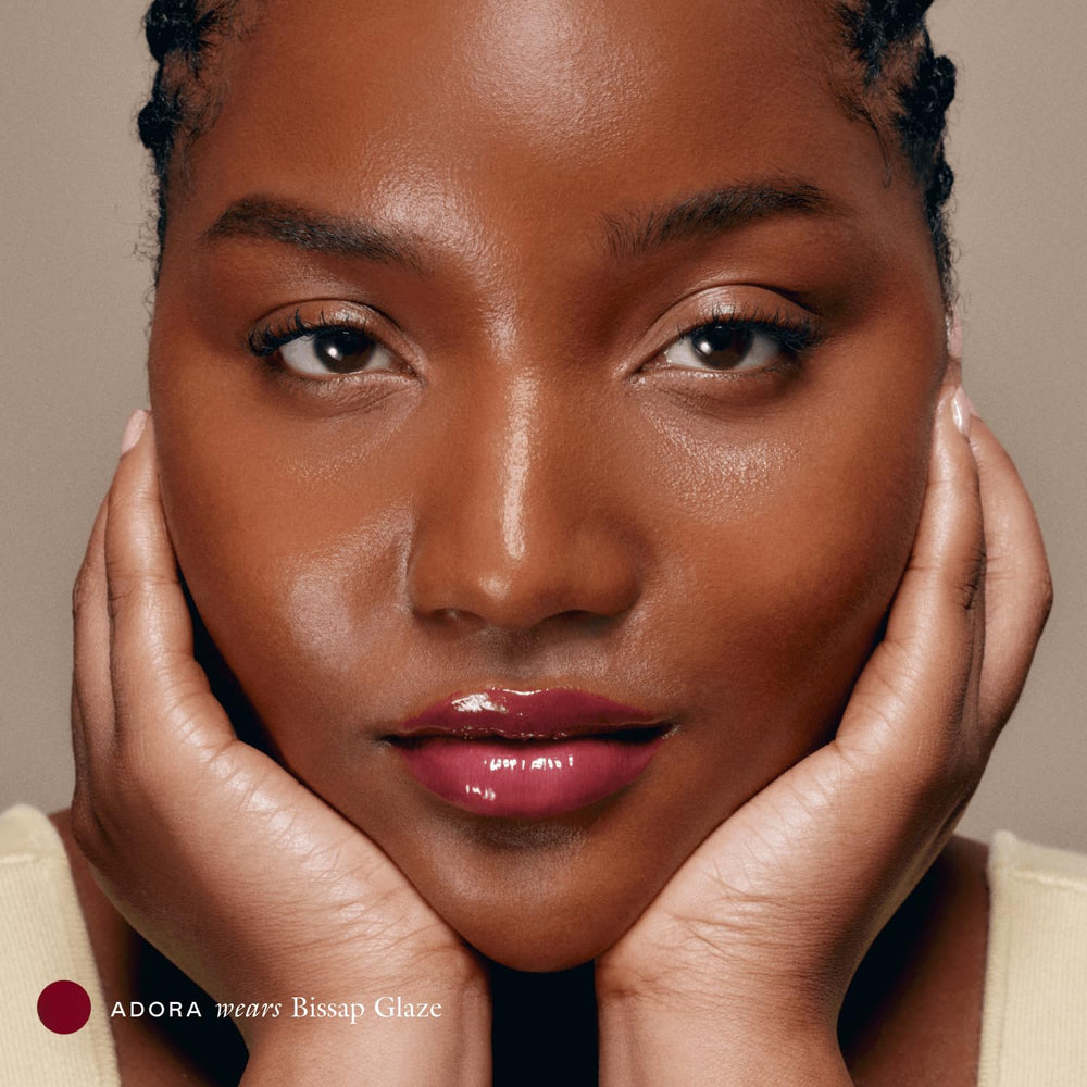 EADEM Le Chouchou balm in close-up applying for glossy moisture