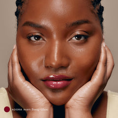 EADEM Le Chouchou balm in close-up applying for glossy moisture