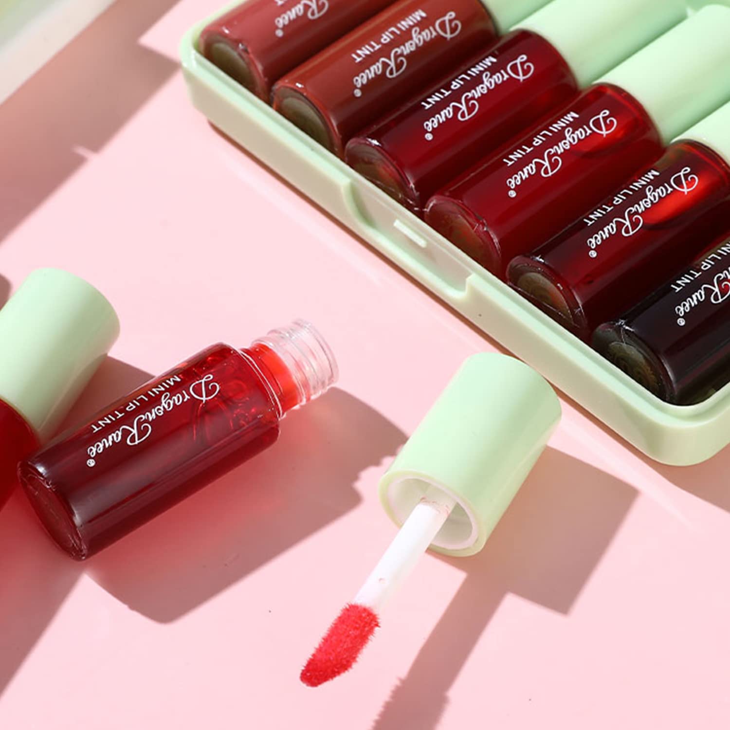Eakroo lip tint color swatch on arm highlights rich pigments across shades