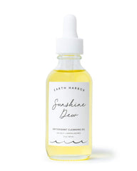 Earth Harbor Sunshine Dew cleanser bottle showing a bright non-greasy finish after makeup removal