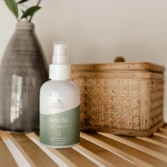 Earth Mama Belly Oil with organic borage and jojoba oils for elasticity support.