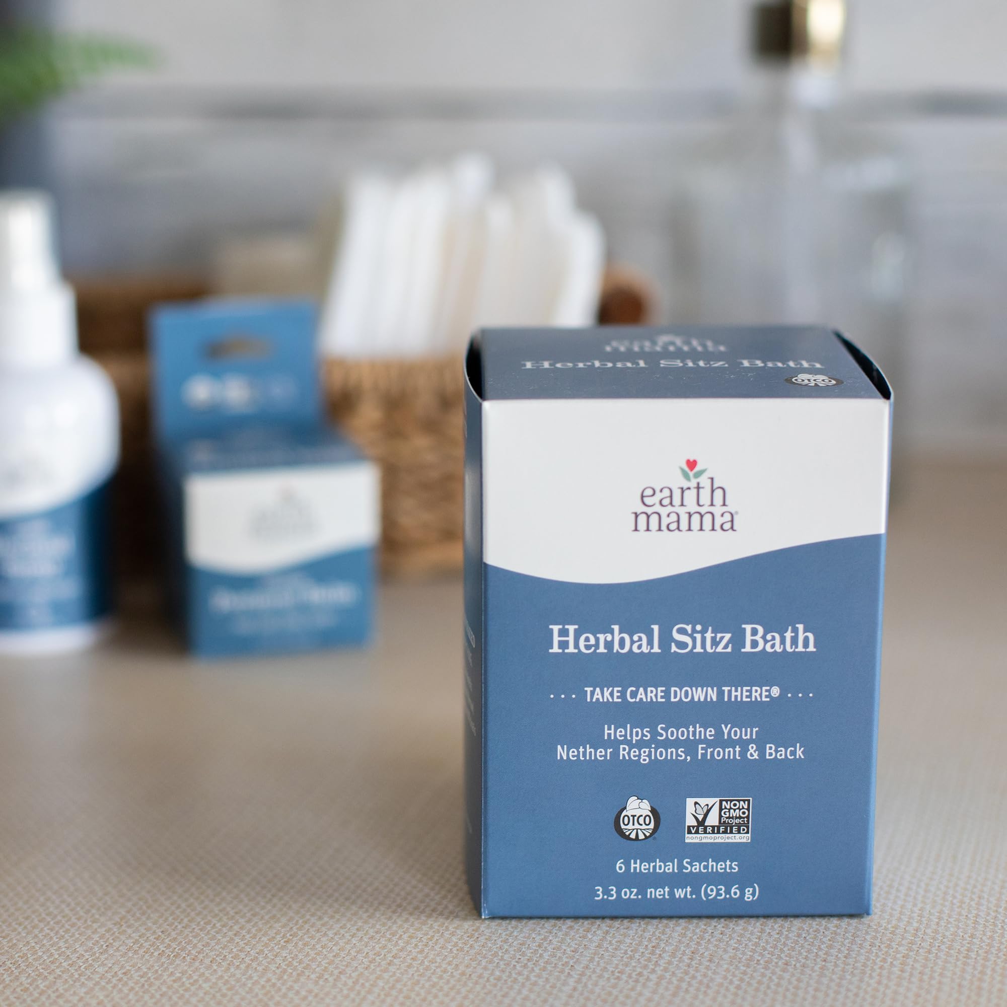 Earth Mama Herbal Sitz Bath compresses shown with cooling post-use options