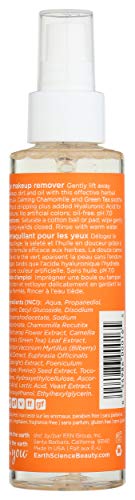 Earth Science makeup remover eye chamomile green tea bottle shown wiping makeup gently.