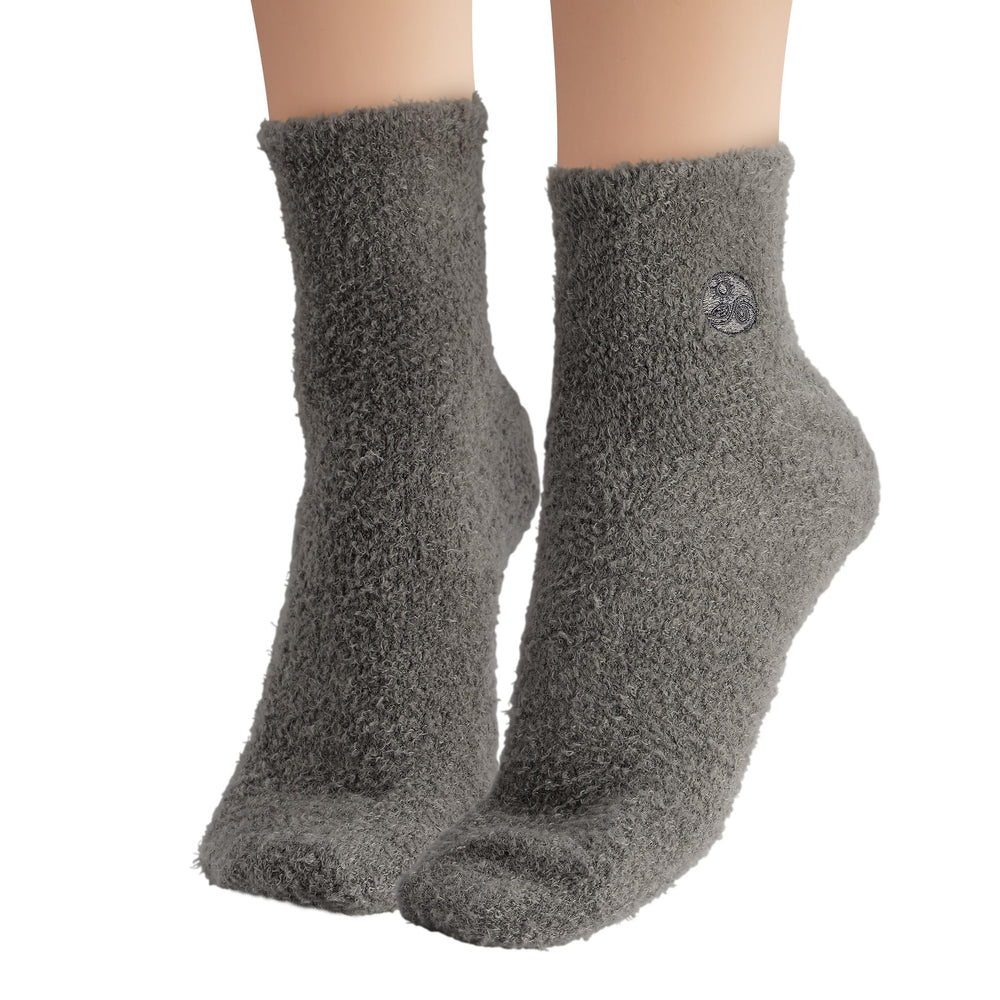 Earth Therapeutics Aloe Socks callus-care close-up suggests skin-softening potential.
