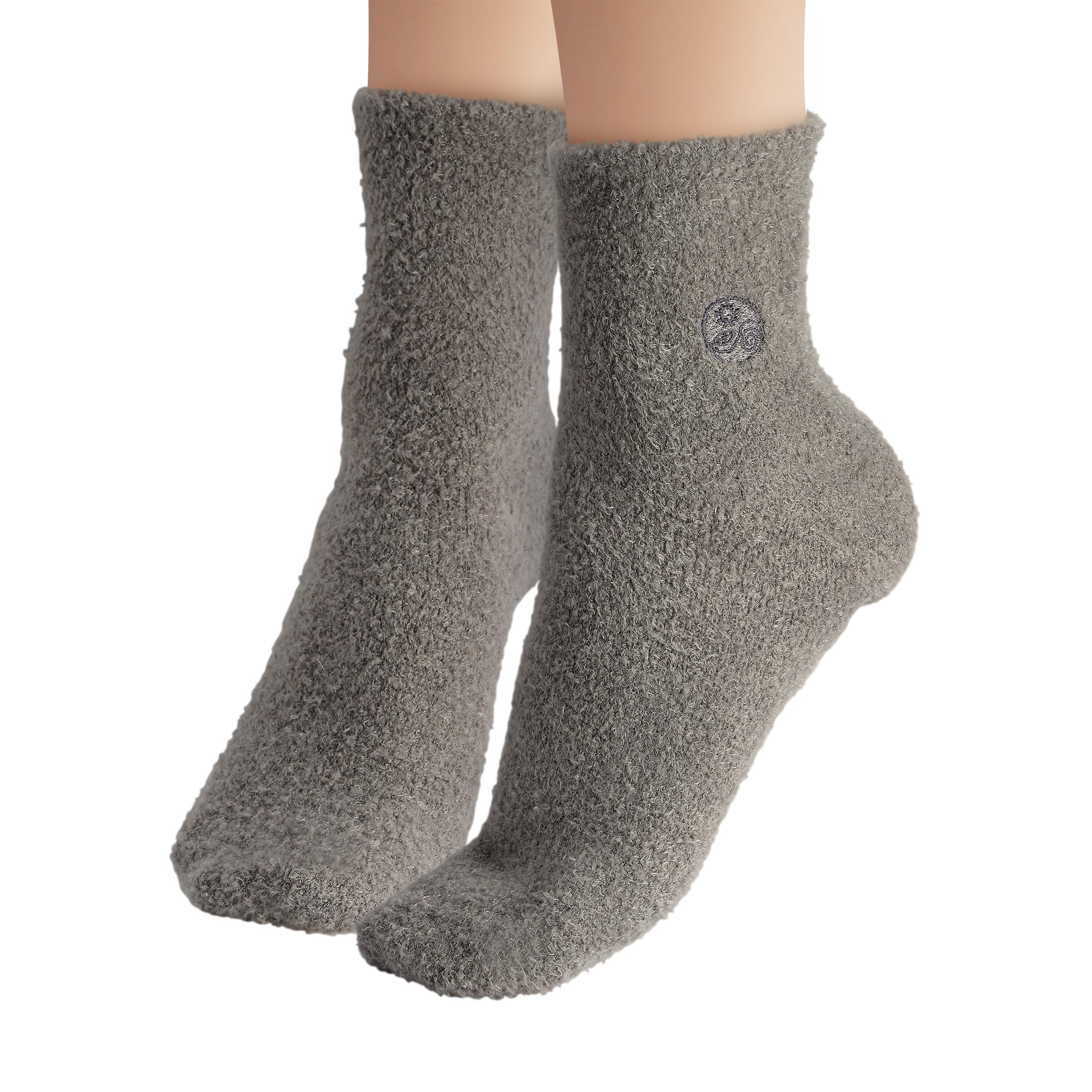 Earth Therapeutics Aloe Socks lotion-pairing setup shows compatible foot care routine.
