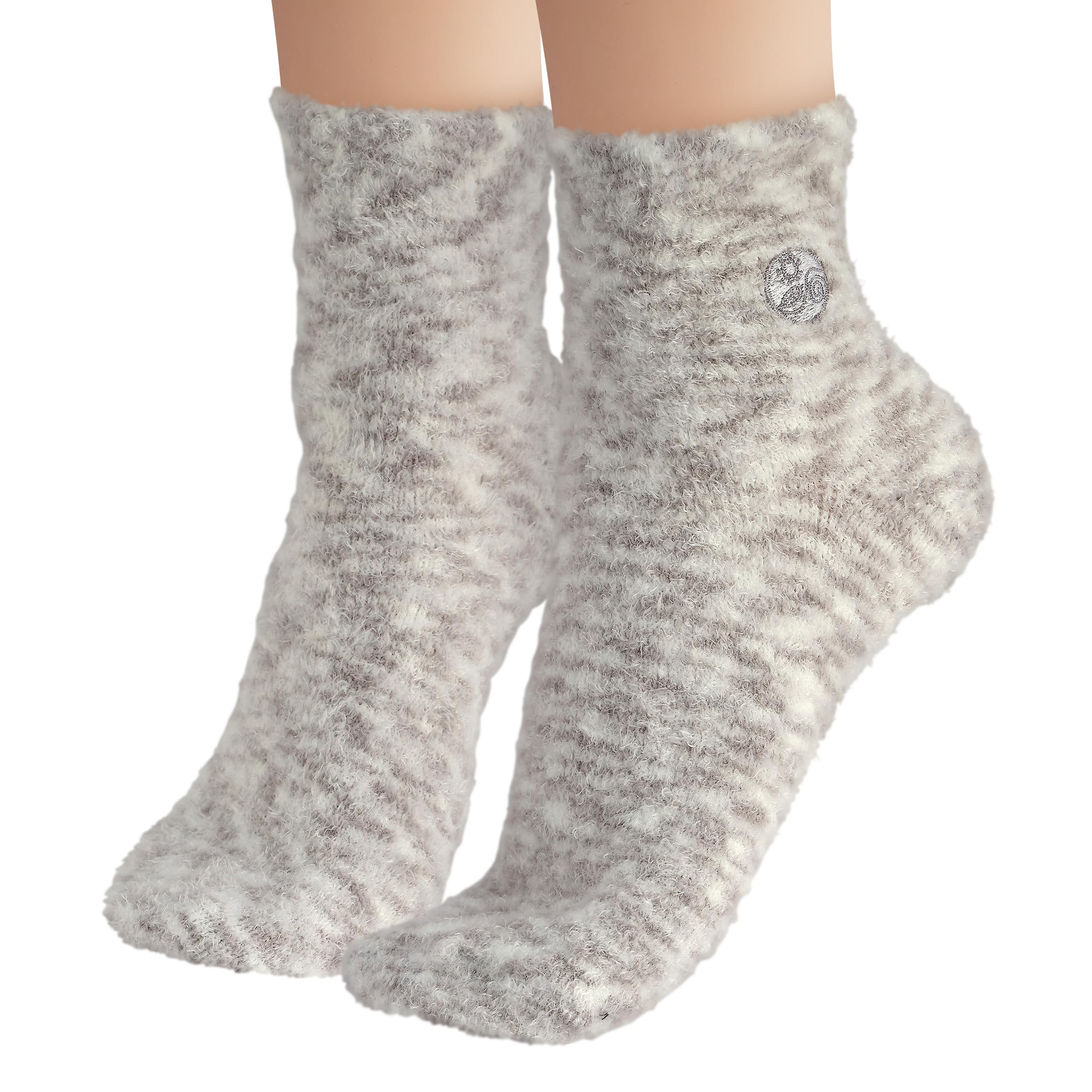 Earth Therapeutics Aloe Socks vitamin-e-infusion close-up emphasizes nourished feet.
