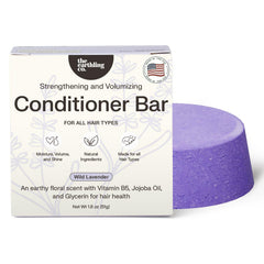 The Earthling Co conditioner bar slip and detangle action for easier brushing.