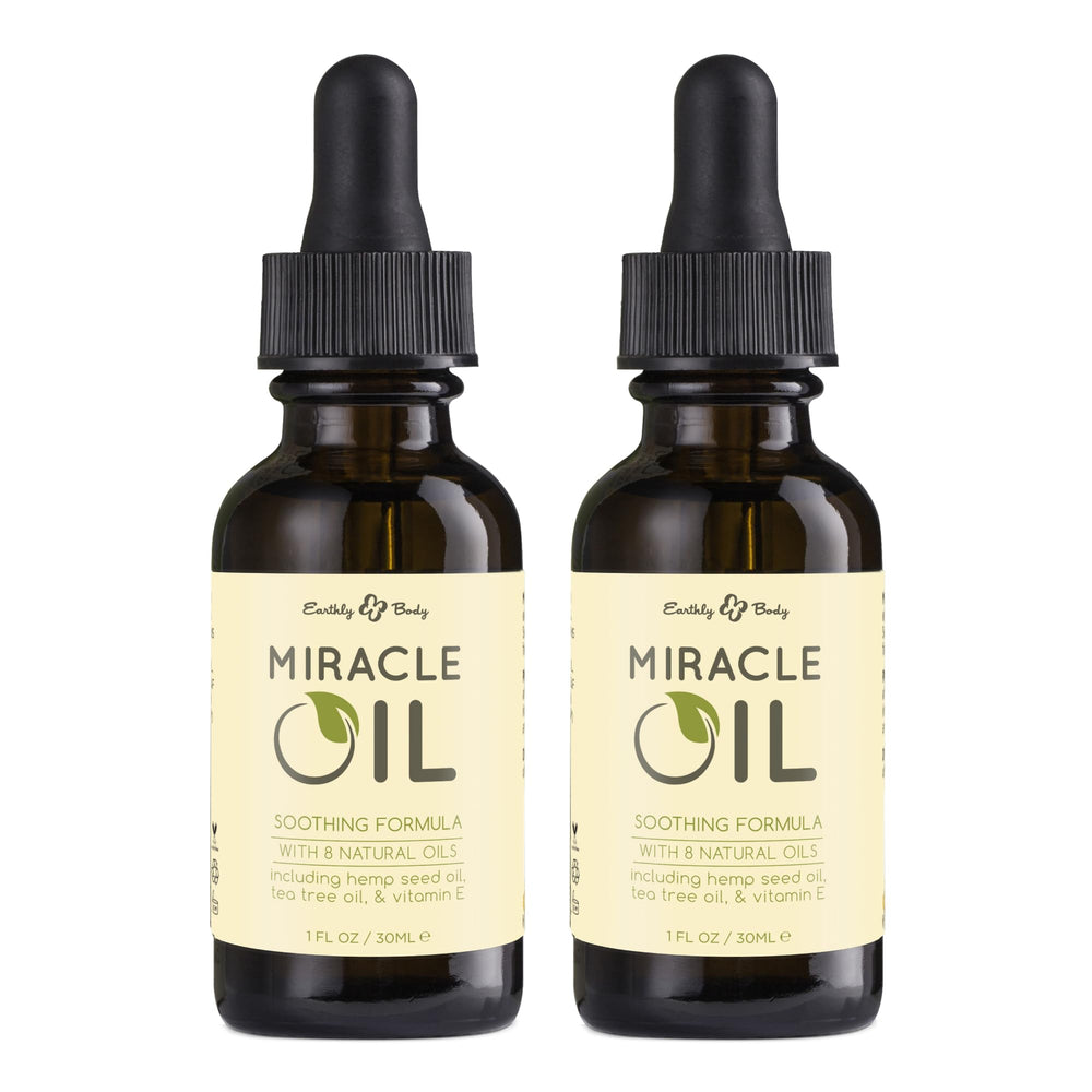 Earthly Body Miracle Oil bottle pour demonstrates versatile hydration for dry skin.