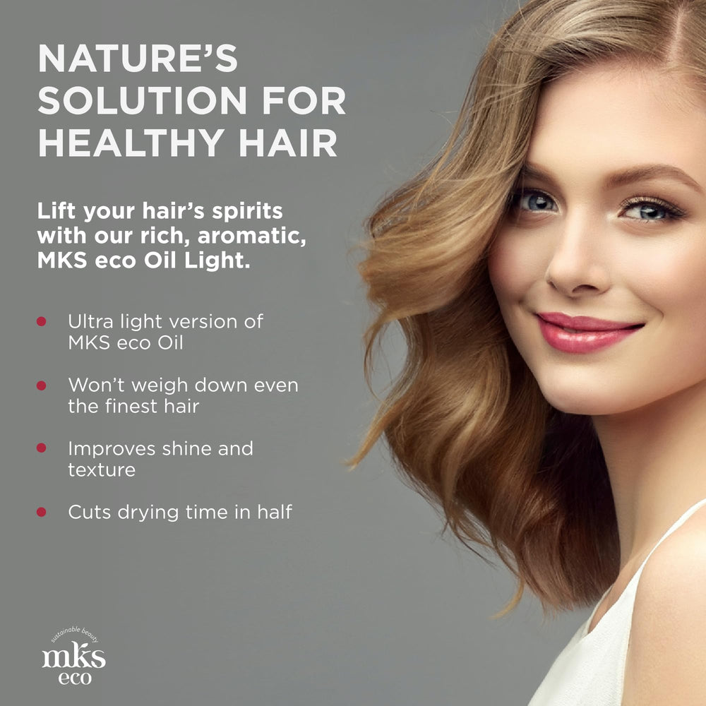 Earthly Body MKS Eco Hair Styling Elixir on hands shows smooth glide and even distribution.