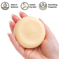 Eco Roots vegan lotion bar on hand shows easy rub-in hydration for dry skin.