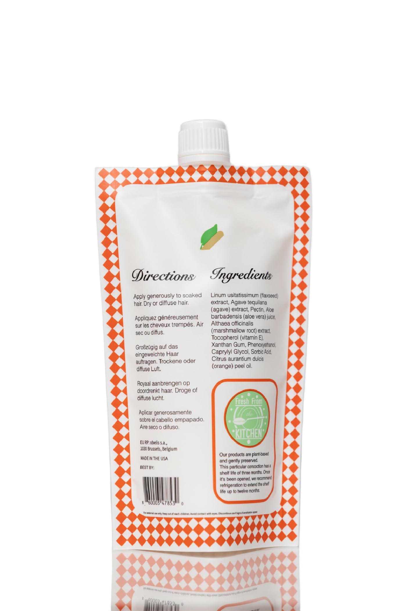 Ecoslay Orange Marmalade shine finish on styled hair.