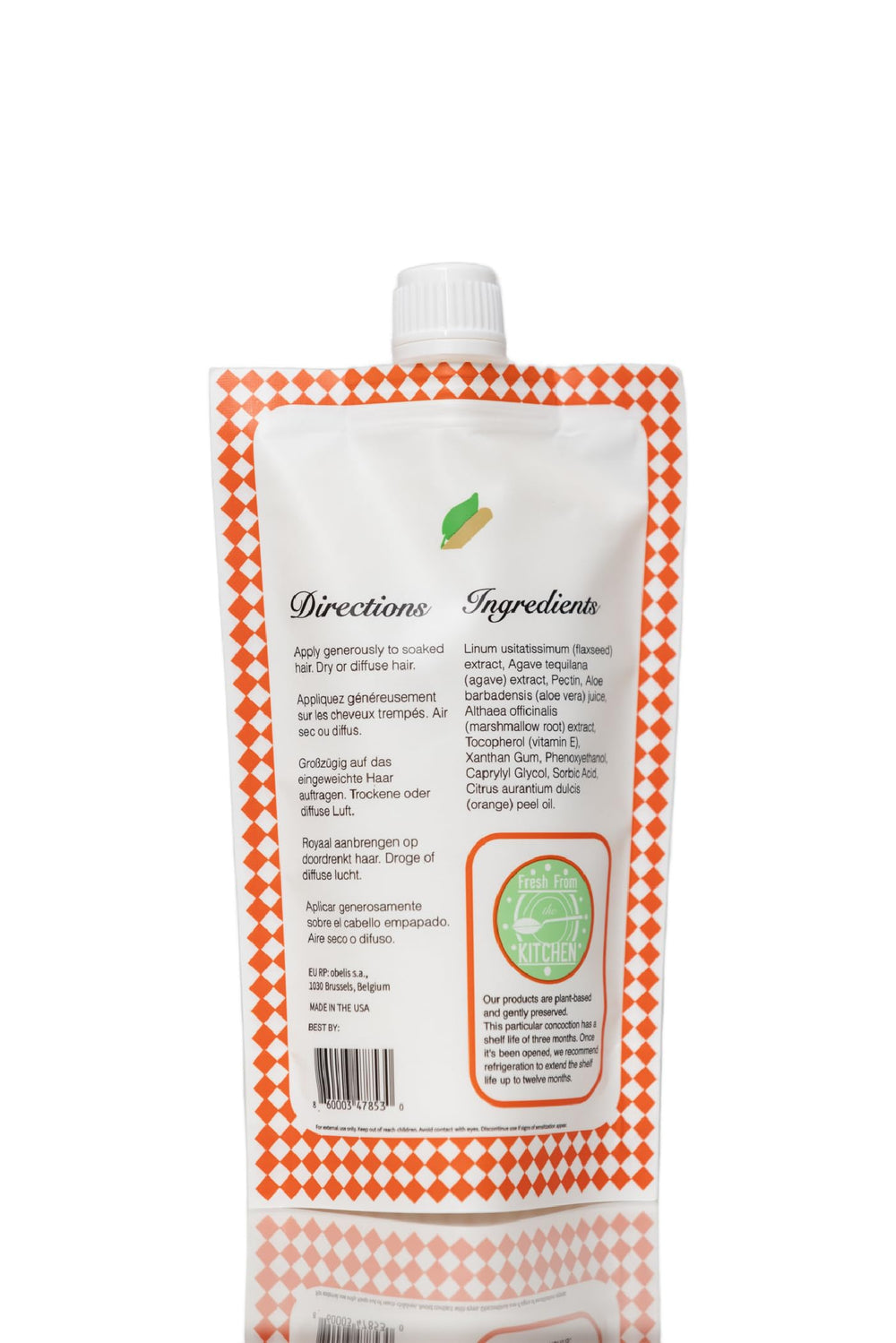 Ecoslay Orange Marmalade shine finish on styled hair.