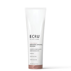 ECRU New York curl-perfect-defining-styling-potion bottle offers lightweight anti-frizz control.