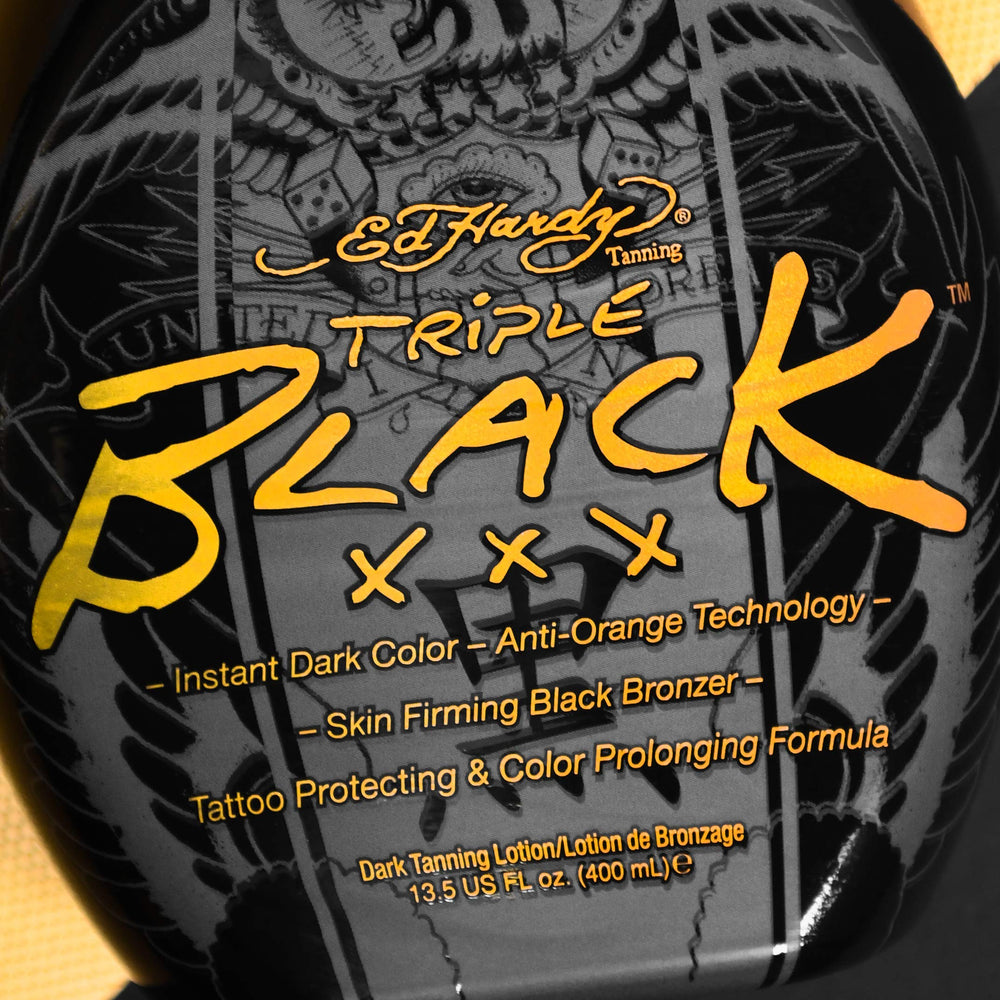Ed Hardy Black XXX blue tansy protects tattoo color and fade during tanning.