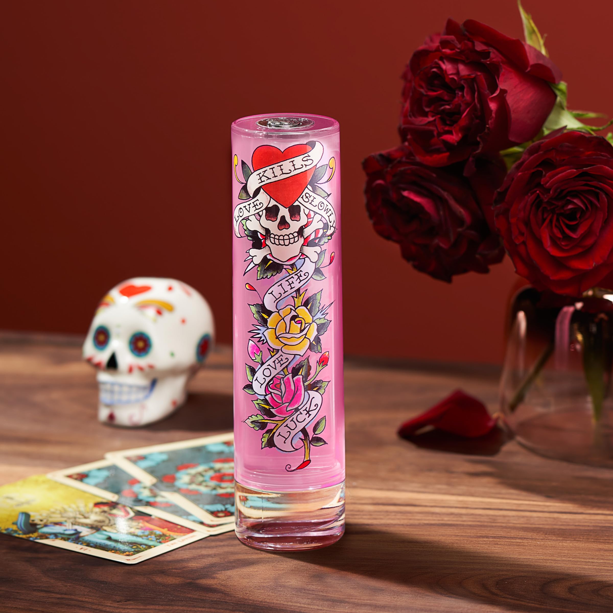Ed Hardy perfume cap close-up shows premium design for easy spray