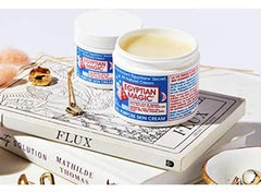 Egyptian Magic cream hands application demonstrating deep hydration for dry patches.