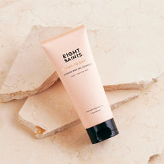 Eight Saints ingredients close-up featuring Vitamin C and clays for brightening.