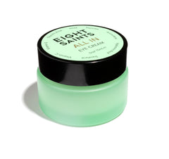 Eight Saints eye cream jar closeup showing lightweight hydration for under-eye area.