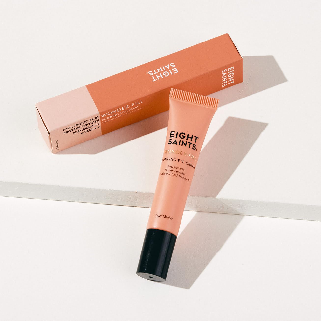 Eight Saints Wonder-fill eye cream applied under-eye for smooth absorption.