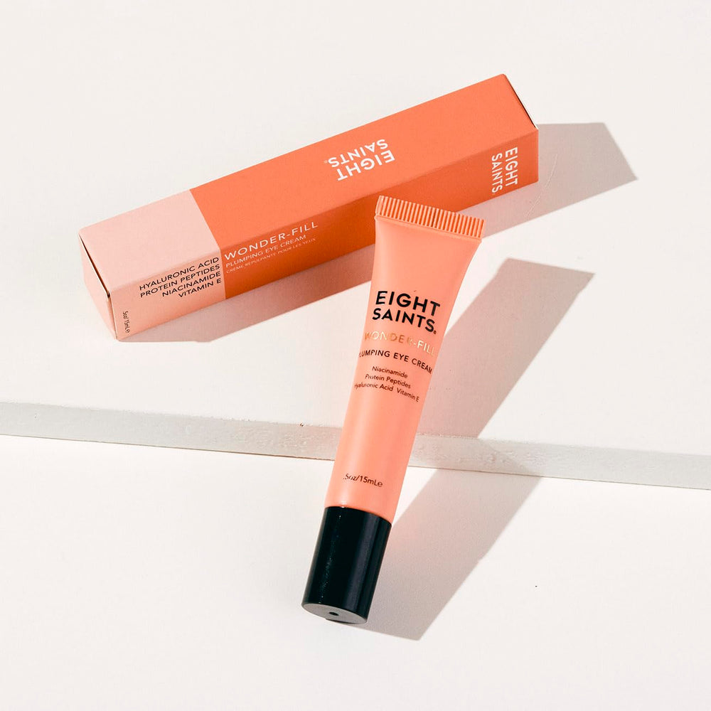 Eight Saints Wonder-fill eye cream applied under-eye for smooth absorption.