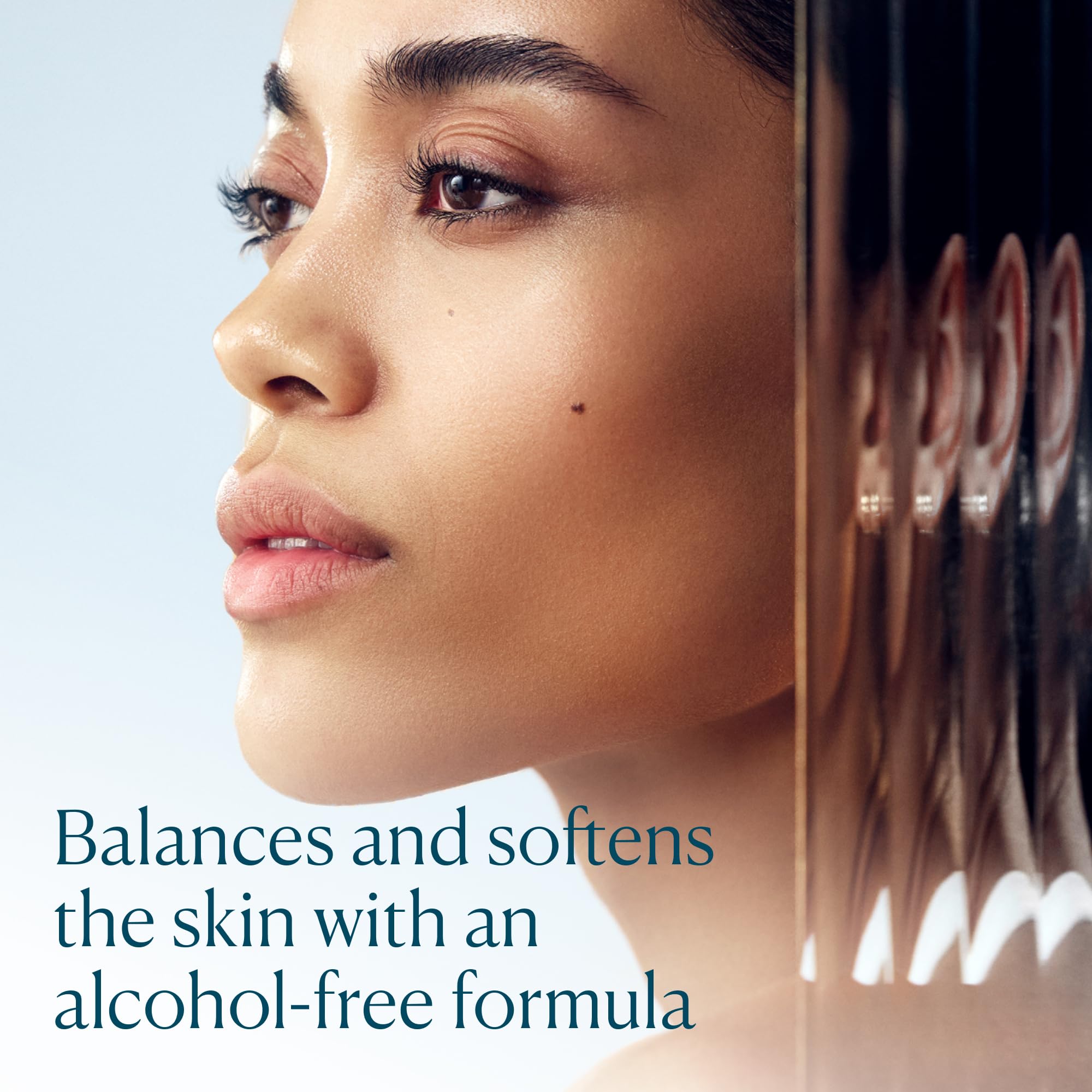 ELEMIS Balancing Toner being poured to show its calming lavender infusion.