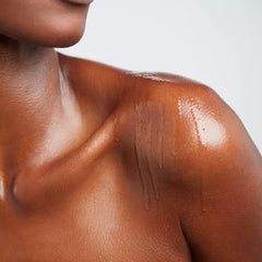 ELEMIS Frangipani Monoi Body Oil texture close-up for hydration.