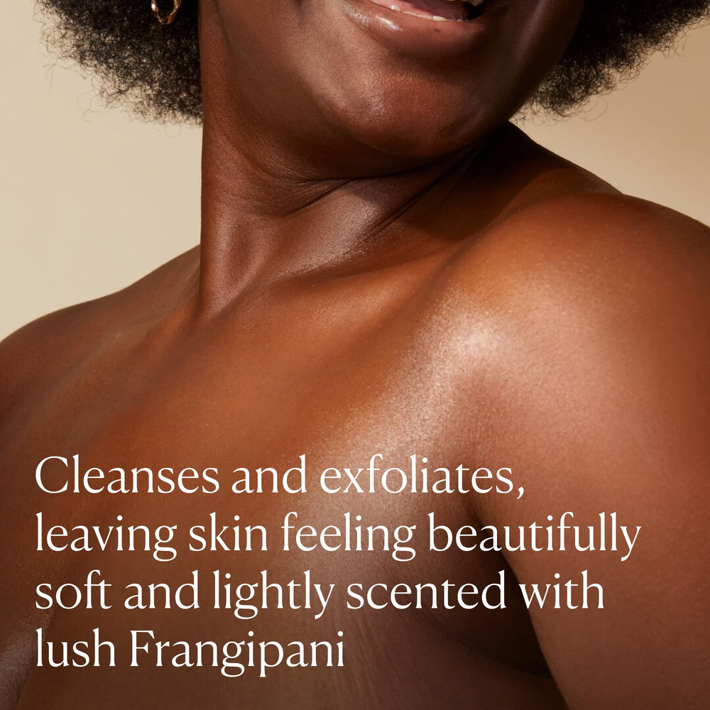 Elemis Frangipani Monoi Salt Glow jar close-up shows creamy scrub texture.
