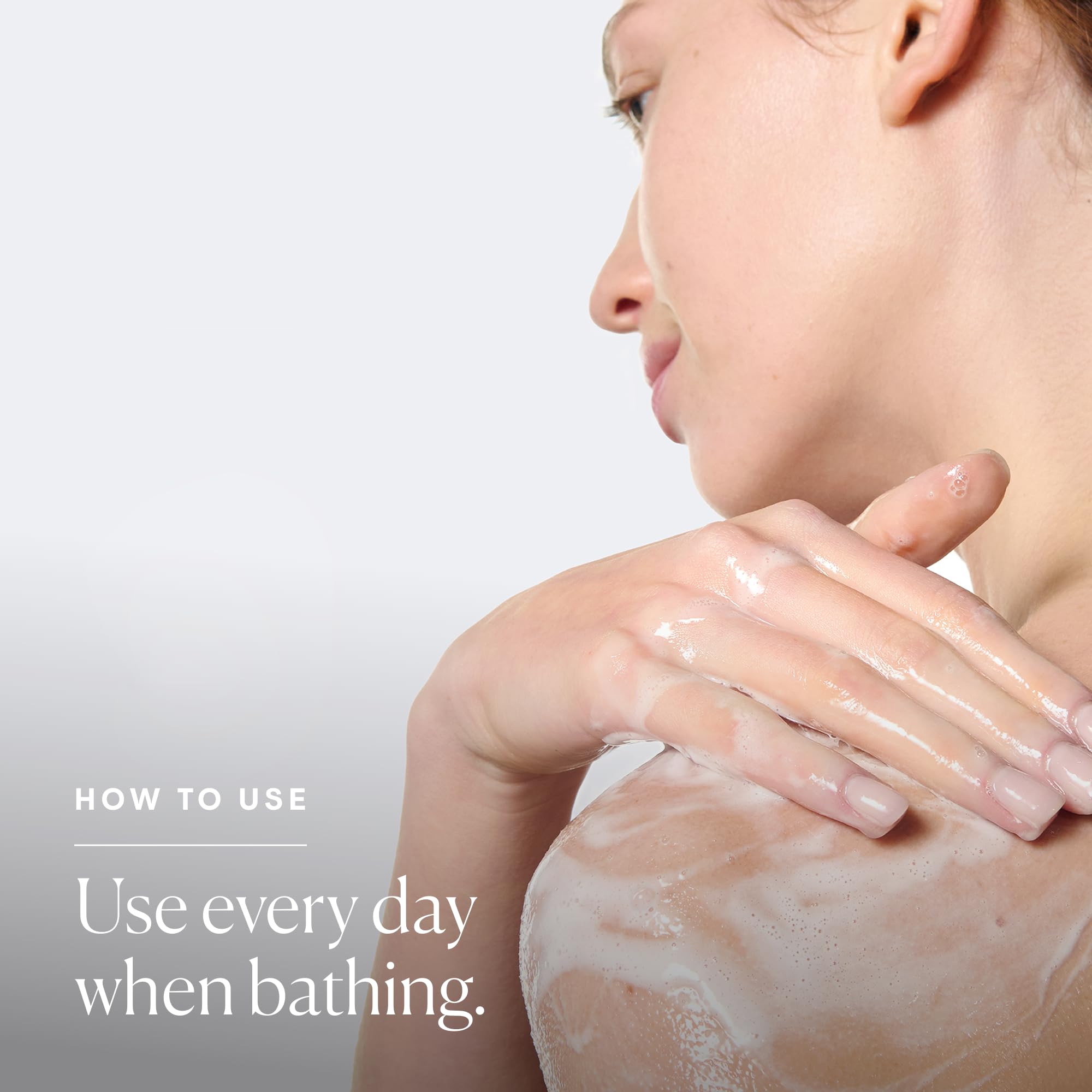 Elemis Frangipani Monoi shower cream foam close-up highlighting creamy texture for daily use.