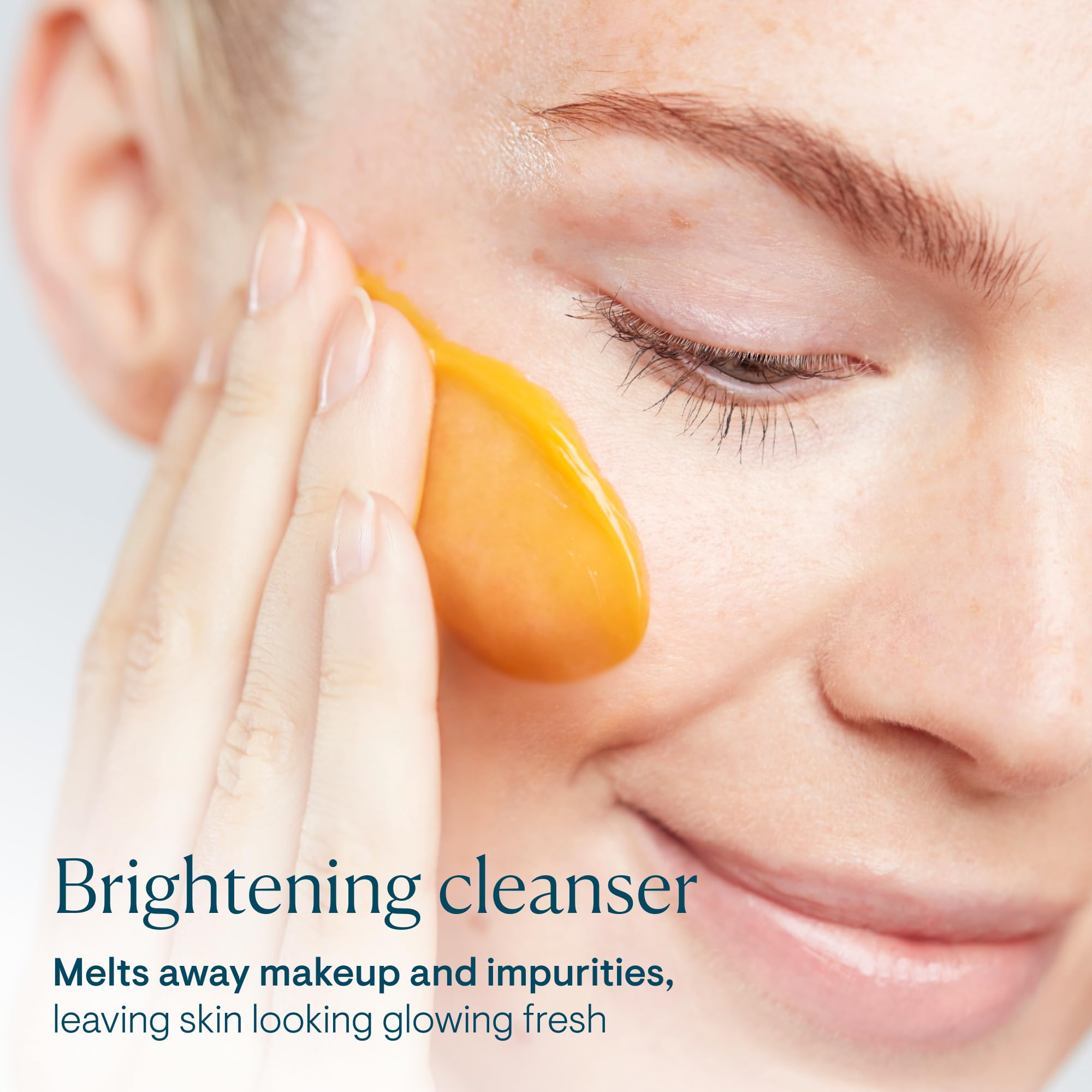 ELEMIS cleansing butter applied to dry skin for makeup removal and hydration.