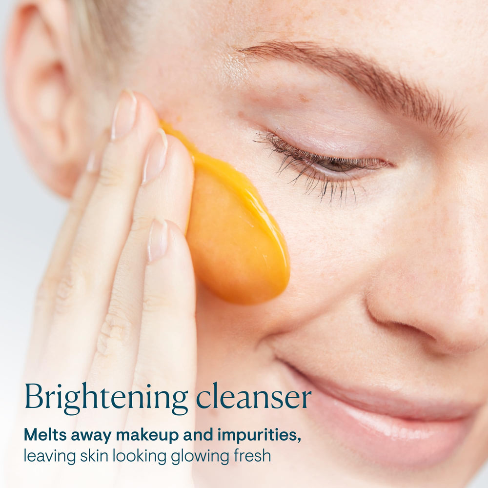 ELEMIS cleansing butter applied to dry skin for makeup removal and hydration.