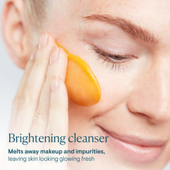 ELEMIS cleansing butter applied to dry skin for makeup removal and hydration.