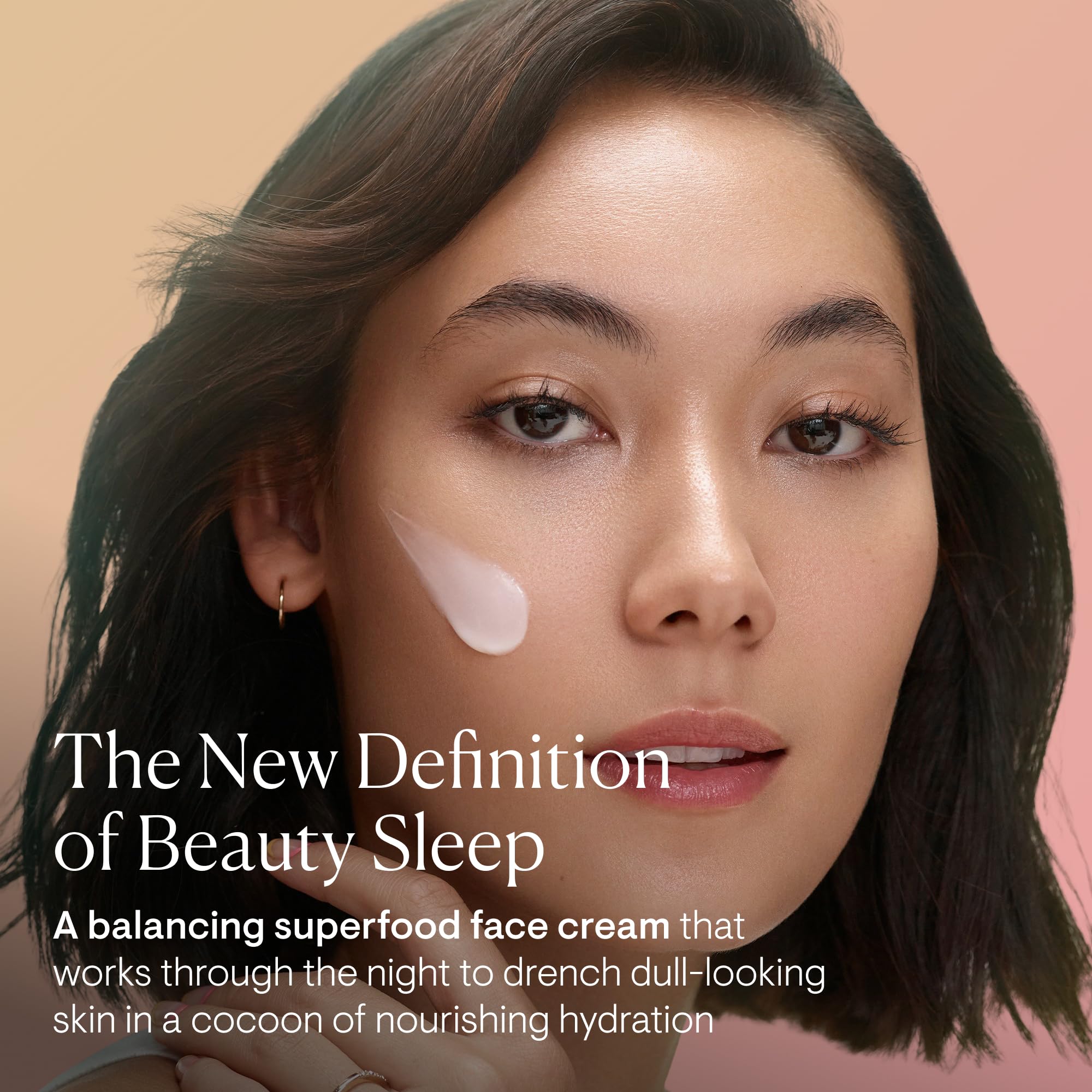 ELEMIS Midnight Facial jar close-up shows creamy texture for night-time hydration.