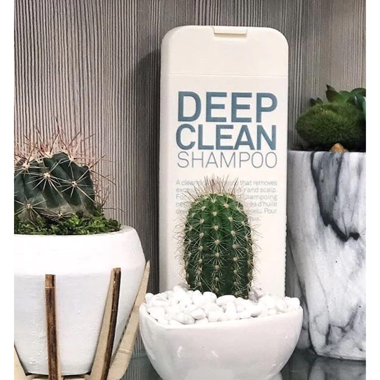 ELEVEN AUSTRALIA Deep Clean shampoo scalp close-up suggests relief from buildup and oils.