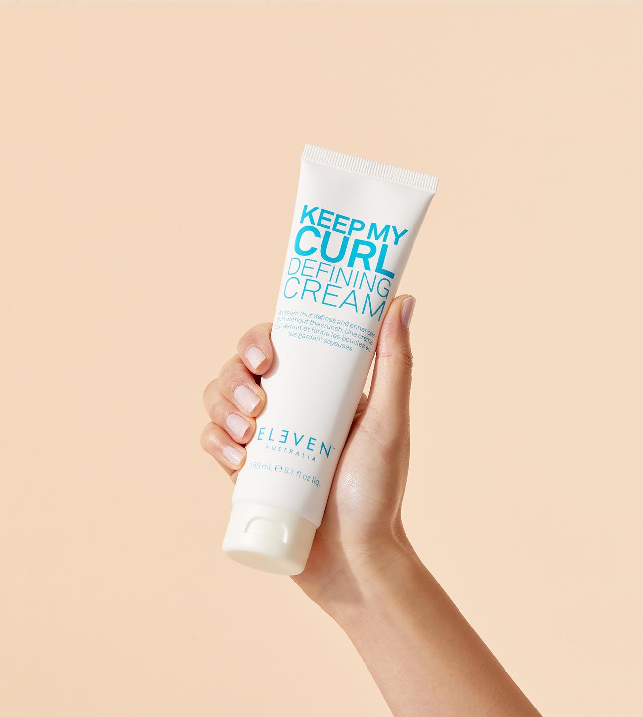 ELEVEN AUSTRALIA Keep My Curl Defining Cream on diffuser-ready curls for enhanced definition.