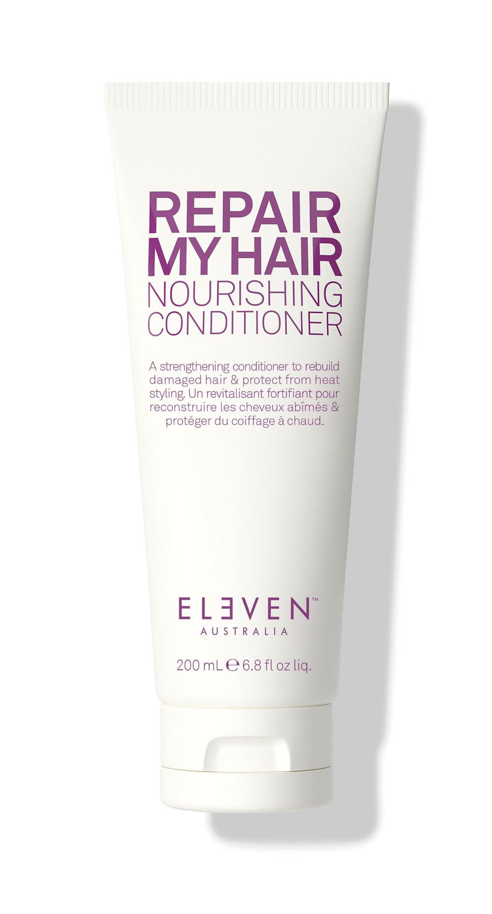 ELEVEN AUSTRALIA Repair My Hair Conditioner bottle closeup highlighting hydrating repair for damaged hair