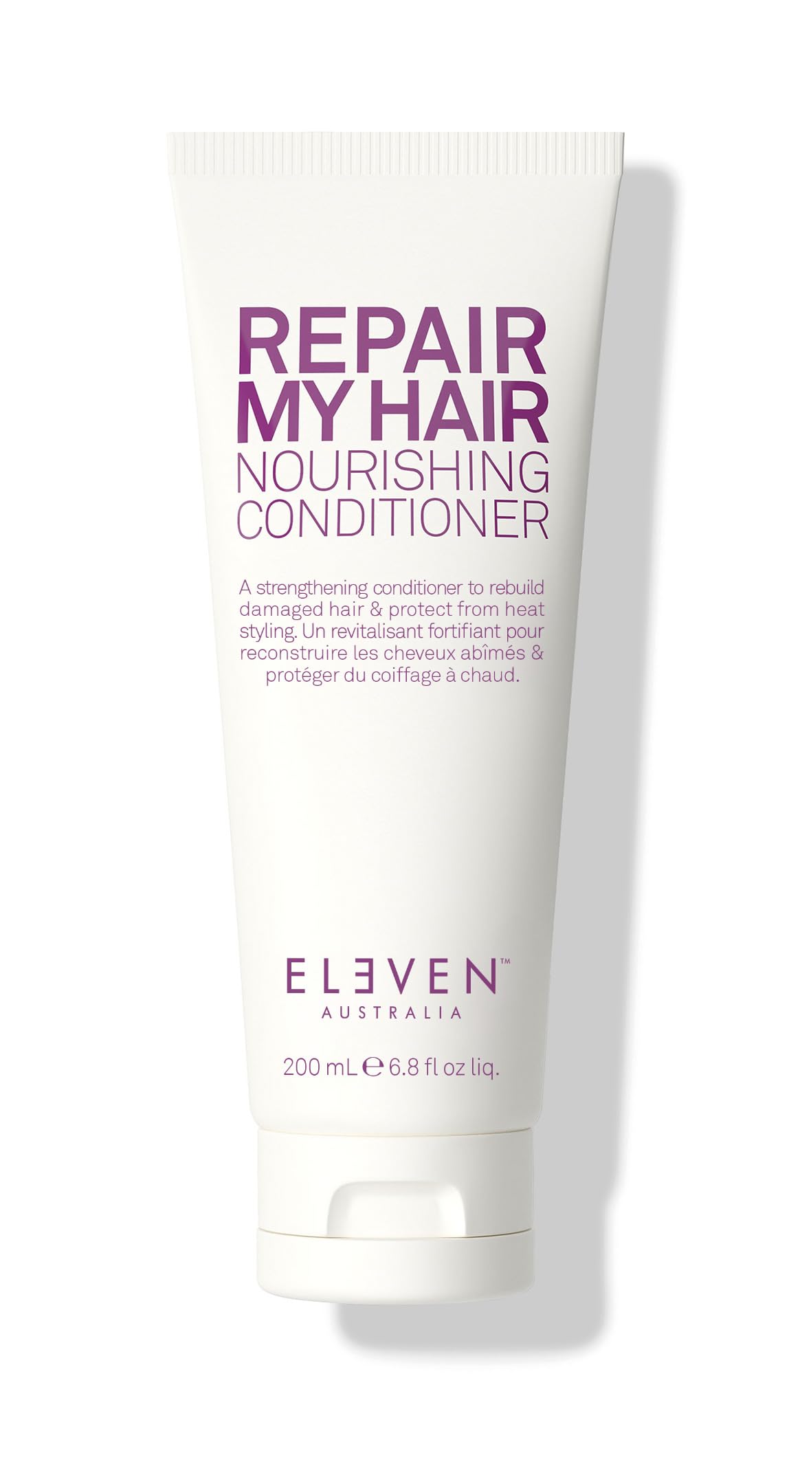 ELEVEN AUSTRALIA Repair My Hair Conditioner bottle closeup highlighting hydrating repair for damaged hair