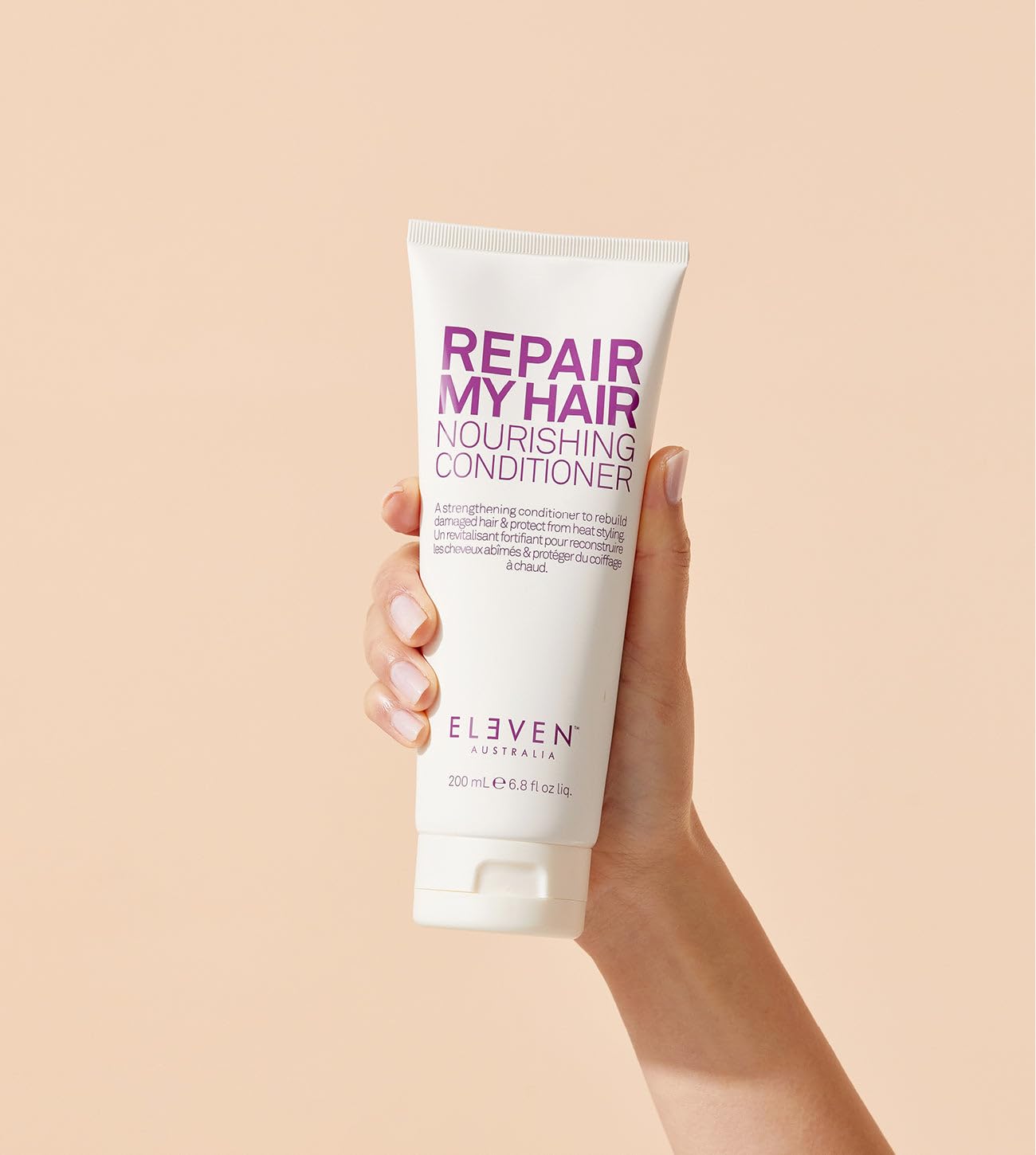 ELEVEN AUSTRALIA Repair My Hair Conditioner packaging shot emphasizing sulfate- and paraben-free formula