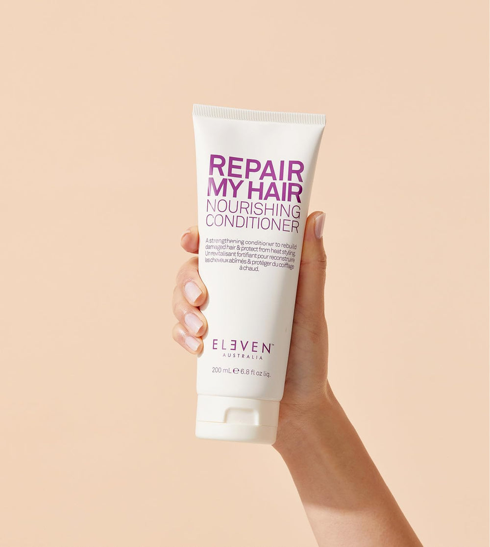 ELEVEN AUSTRALIA Repair My Hair Conditioner packaging shot emphasizing sulfate- and paraben-free formula