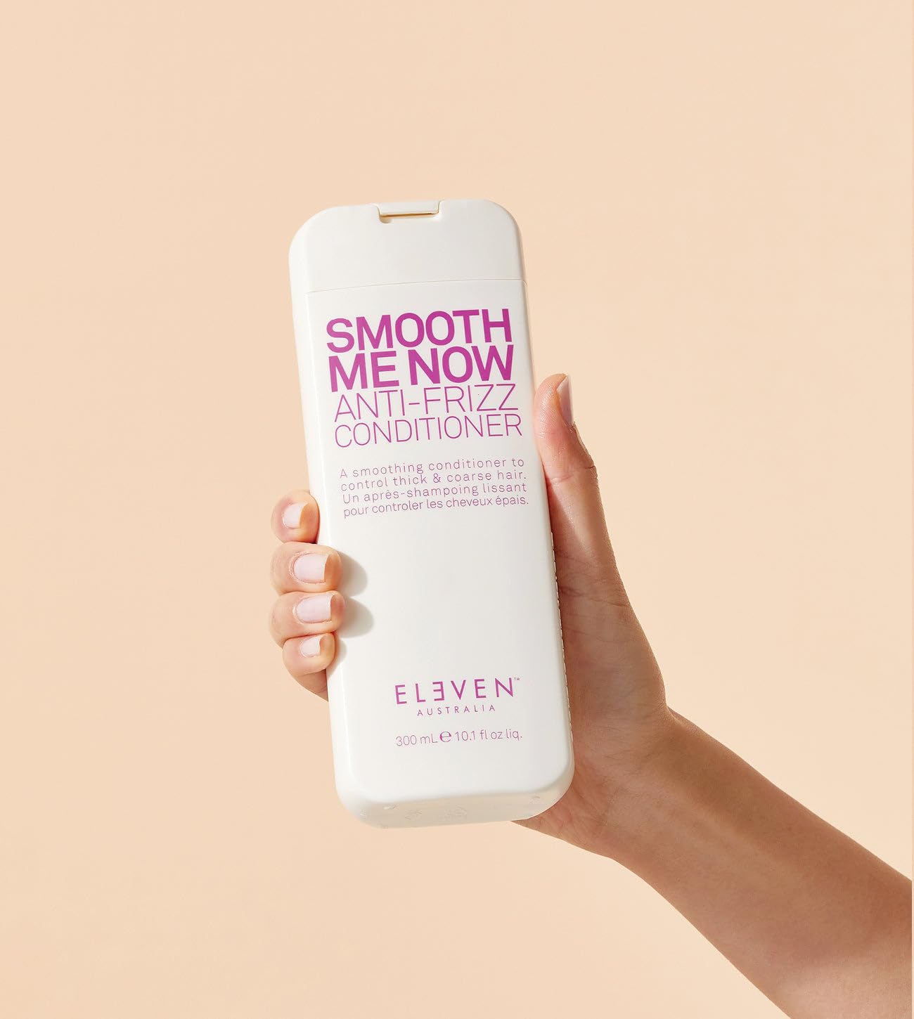 ELEVEN AUSTRALIA Smooth Me Now conditioner hair-application scene demonstrating detangling and smoothing