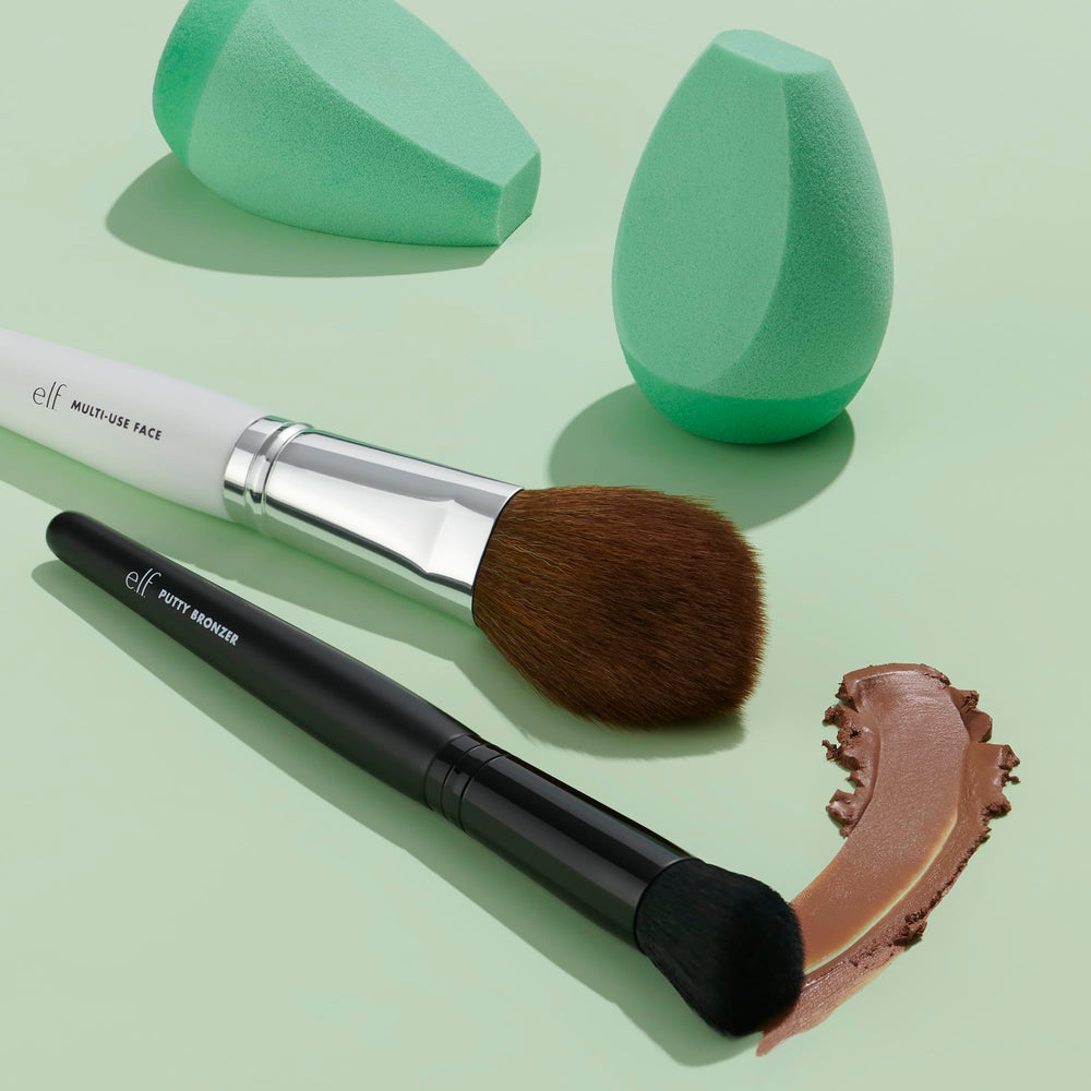 e.l.f. silicone bottom keeps foundation separate from sponge, reducing mess.