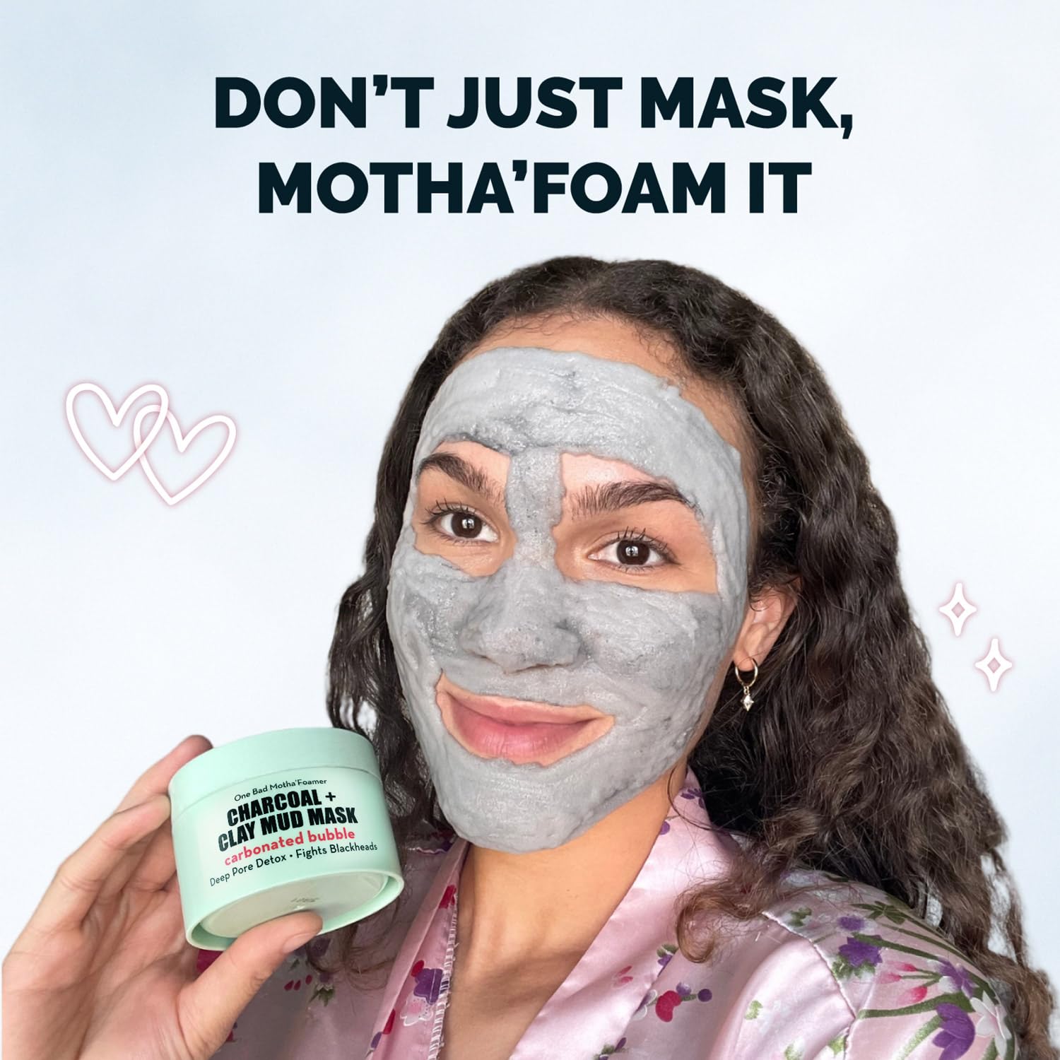 Elizabeth Mott carbonated bubble detox mask charcoal application demonstrates detoxifying pore cleansing.