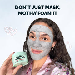 Elizabeth Mott carbonated bubble detox mask charcoal application demonstrates detoxifying pore cleansing.