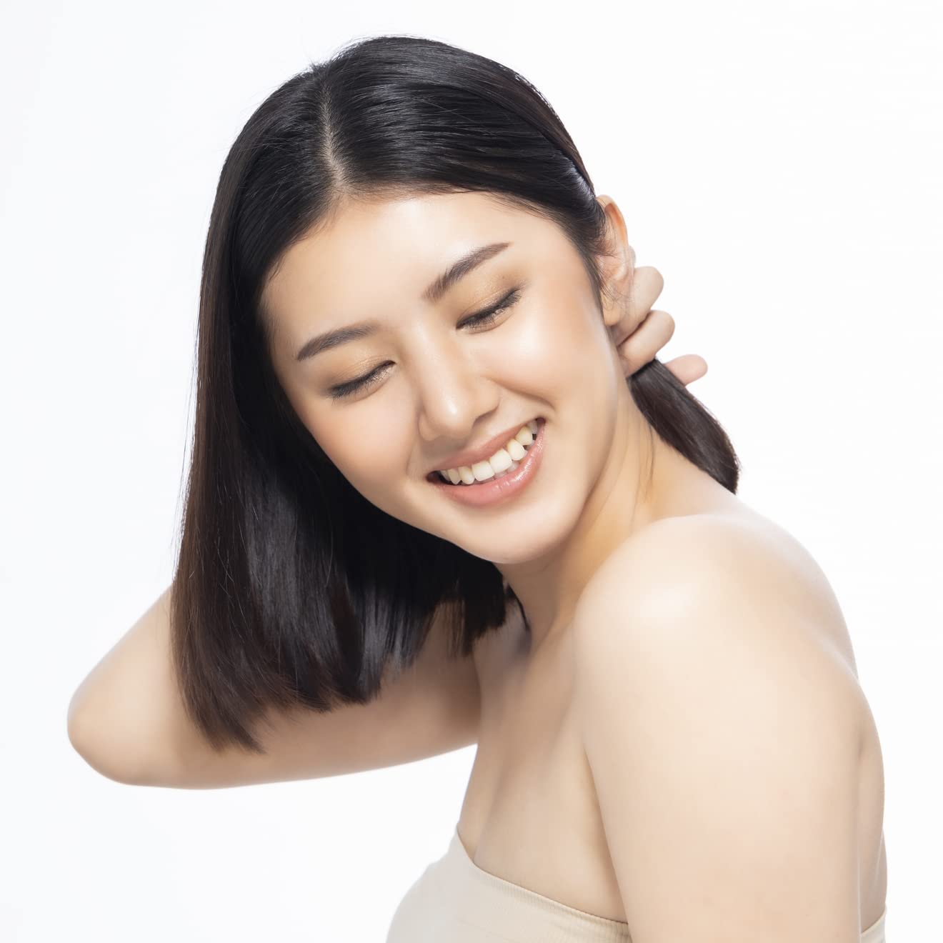 Elizabeth Mott Thank Me Later anti-frizz close-up for smoother hair.